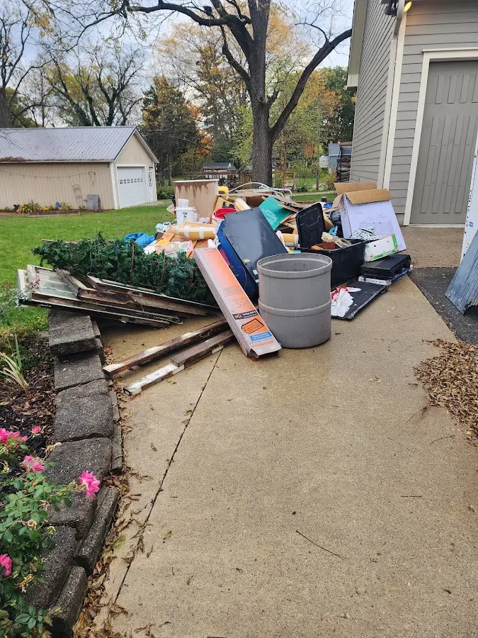 Dumpster being loaded with debris for 3 Yard Dumpster Rental in Lake Shastina